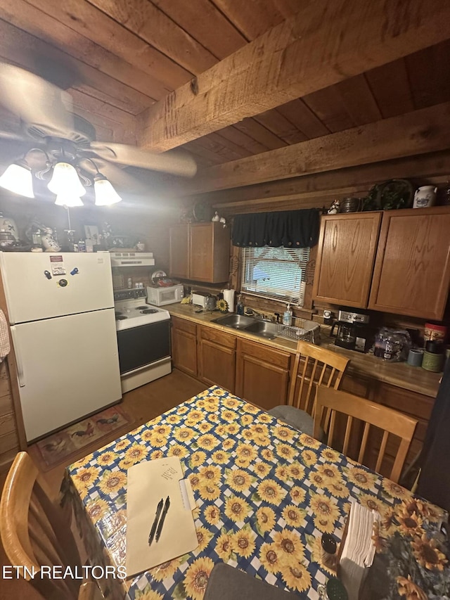 487 Straight Branch Rd, Speedwell, TN 37870 - kitchen featuring white appliances, a wood ceiling with exposed beams, wood finished floors, light countertops, and brown cabinetry