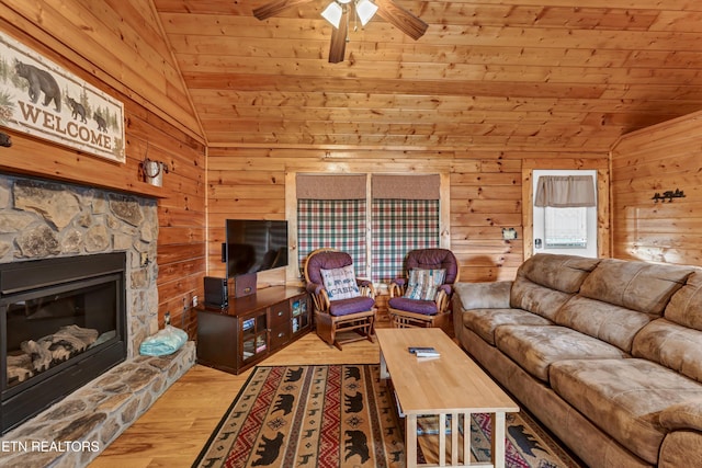 1528 Rainbow Ridge Way, Sevierville, TN 37862 - living area with vaulted ceiling, wooden ceiling, wooden walls, ceiling fan, and wood finished floors