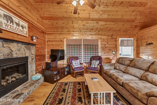 1528 Rainbow Ridge Way, Sevierville, TN 37862 - living area with vaulted ceiling, wooden ceiling, wooden walls, ceiling fan, and wood finished floors