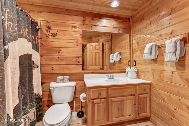 1528 Rainbow Ridge Way, Sevierville, TN 37862 - full bathroom featuring wooden walls, vanity, wooden ceiling, and tile patterned floors