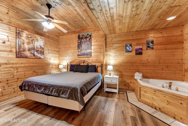 1528 Rainbow Ridge Way, Sevierville, TN 37862 - bedroom with wood ceiling, wood finished floors, wooden walls, and a ceiling fan