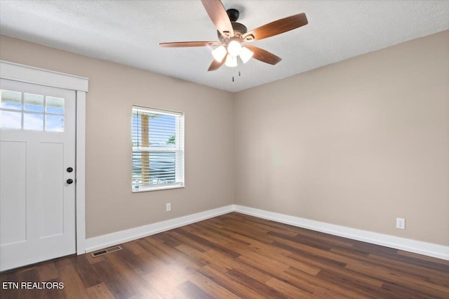 715 E Kentucky Ave, Lafollette, TN 37766 - foyer with wood finished floors, healthy amount of natural light, a ceiling fan, and a textured ceiling