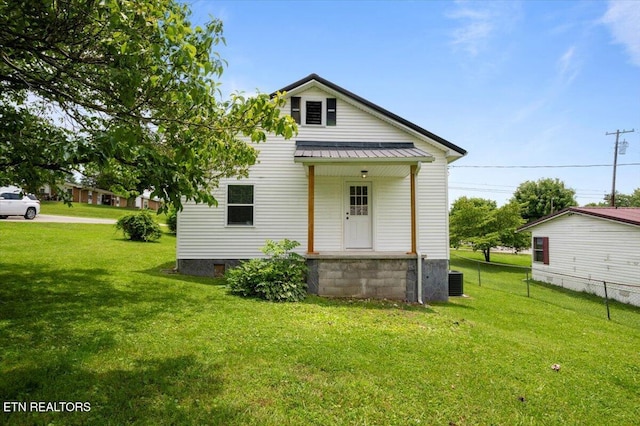 715 E Kentucky Ave, Lafollette, TN 37766 - back of house featuring crawl space and a metal roof