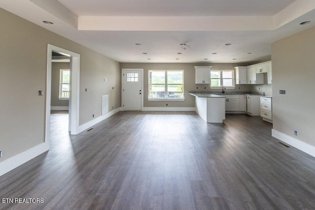 132 Galloway Airport Rd, Dunlap, TN 37327 - kitchen with dark wood-style flooring, white cabinetry, open floor plan, recessed lighting, and a center island