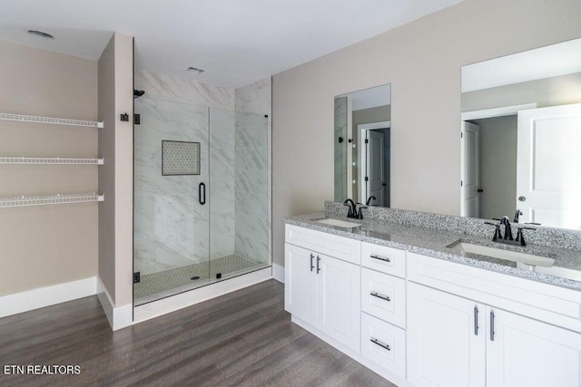 132 Galloway Airport Rd, Dunlap, TN 37327 - bathroom featuring wood finished floors, a marble finish shower, and double vanity