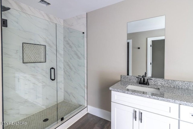 132 Galloway Airport Rd, Dunlap, TN 37327 - bathroom with wood finished floors, vanity, and a stall shower