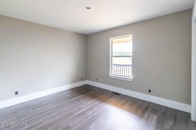 132 Galloway Airport Rd, Dunlap, TN 37327 - unfurnished room featuring baseboards and dark wood finished floors