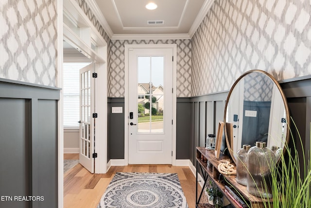 11914 Sandy Run Rd, Knoxville, TN 37934 - entryway with wallpapered walls, ornamental molding, and light wood-style flooring