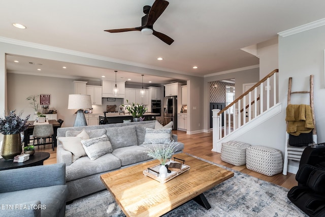 11914 Sandy Run Rd, Knoxville, TN 37934 - living area with recessed lighting, light wood-style floors, a ceiling fan, stairway, and crown molding