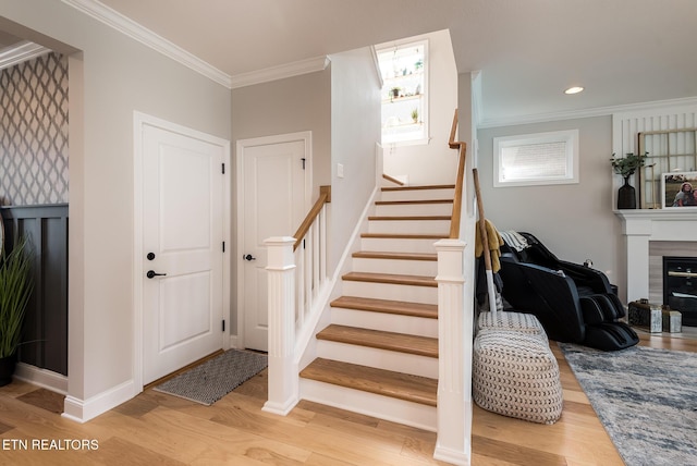 11914 Sandy Run Rd, Knoxville, TN 37934 - stairway with a glass covered fireplace, ornamental molding, wood finished floors, and recessed lighting