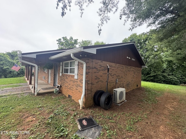 1637 Jefferson St, Morristown, TN 37814 - view of property exterior with brick siding and a lawn