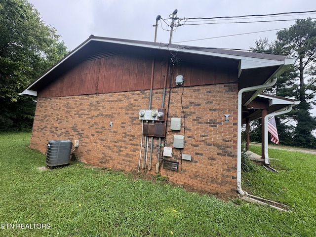 1637 Jefferson St, Morristown, TN 37814 - view of home's exterior with a yard and brick siding