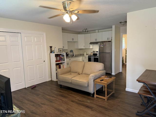 1637 Jefferson St, Morristown, TN 37814 - living area with ceiling fan and dark wood finished floors