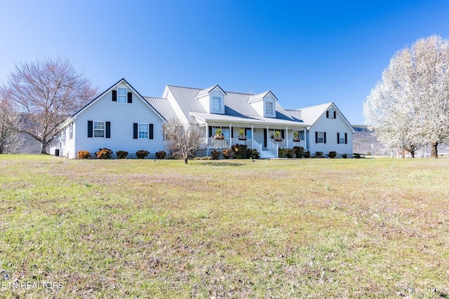 361 River Dr, Dunlap, TN 37327 - cape cod-style house featuring a porch and a front lawn