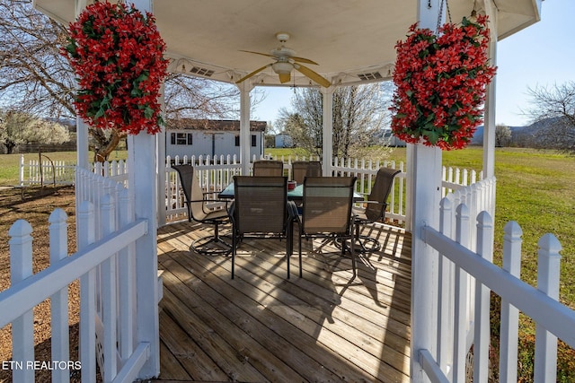 361 River Dr, Dunlap, TN 37327 - wooden terrace featuring a ceiling fan, an outbuilding, and outdoor dining area
