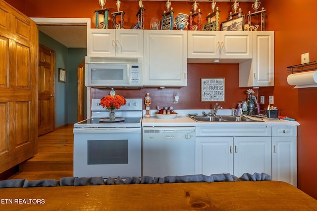 361 River Dr, Dunlap, TN 37327 - kitchen with white appliances, wood finished floors, light countertops, and white cabinets