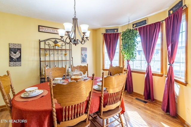 361 River Dr, Dunlap, TN 37327 - dining space with a chandelier and light wood finished floors