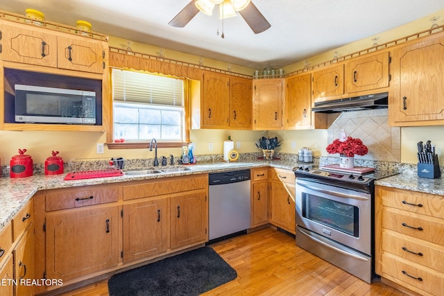 361 River Dr, Dunlap, TN 37327 - kitchen featuring appliances with stainless steel finishes, under cabinet range hood, ceiling fan, and light wood-type flooring