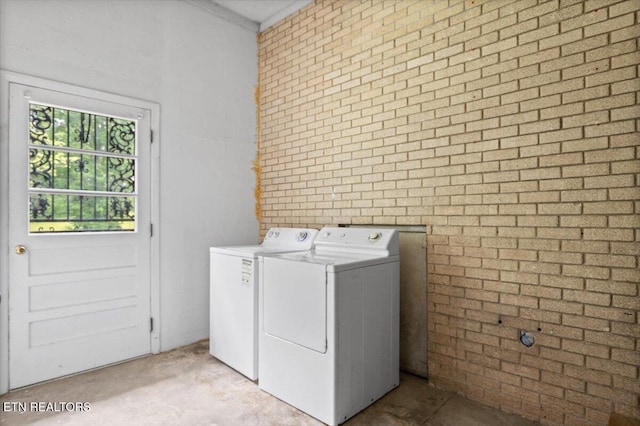 220 Lillywood Dr, Lafollette, TN 37766 - laundry room featuring separate washer and dryer and brick wall