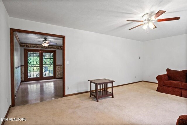 220 Lillywood Dr, Lafollette, TN 37766 - carpeted living area featuring ceiling fan and baseboards