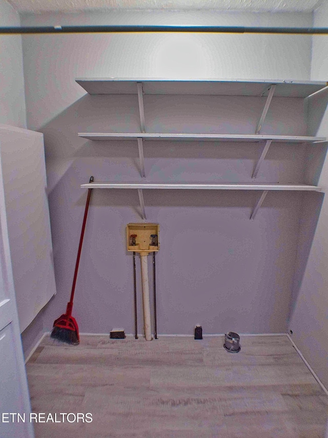 705 S 11th St, Lafollette, TN 37766 - laundry room featuring hookup for a washing machine and wood finished floors