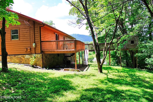 705 S 11th St, Lafollette, TN 37766 - view of grassy yard featuring stairs and a deck with mountain view