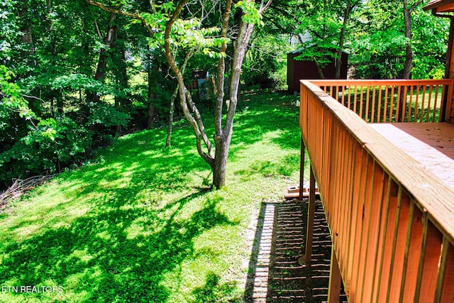 705 S 11th St, Lafollette, TN 37766 - view of green lawn featuring a storage shed and a wooden deck