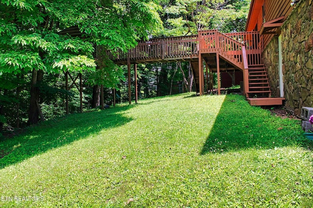 705 S 11th St, Lafollette, TN 37766 - view of green lawn with stairs and a wooden deck