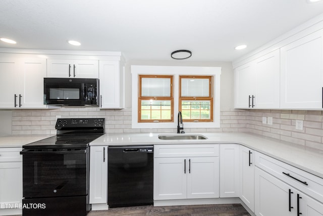 957 W Hunt Rd, Alcoa, TN 37701 - kitchen featuring black appliances, white cabinetry, light countertops, tasteful backsplash, and recessed lighting