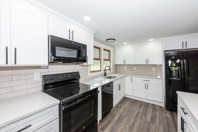 957 W Hunt Rd, Alcoa, TN 37701 - kitchen with black appliances, white cabinets, dark wood-style floors, and recessed lighting