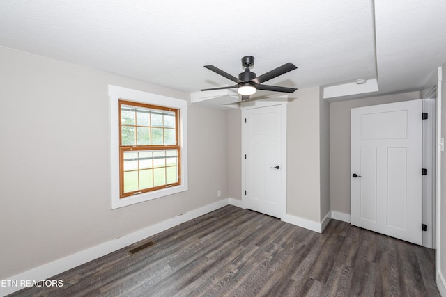 957 W Hunt Rd, Alcoa, TN 37701 - unfurnished bedroom featuring dark wood-style floors, a closet, and ceiling fan