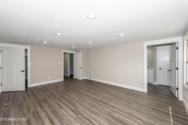 957 W Hunt Rd, Alcoa, TN 37701 - unfurnished living room featuring dark wood-type flooring and recessed lighting