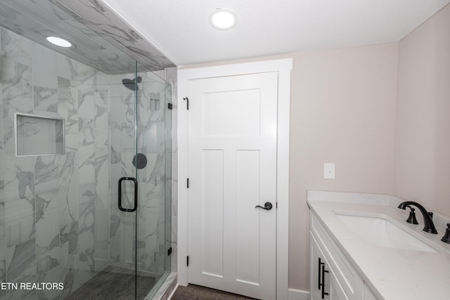 957 W Hunt Rd, Alcoa, TN 37701 - bathroom featuring a marble finish shower, vanity, and recessed lighting