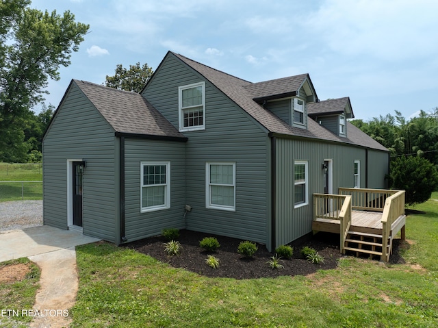 957 W Hunt Rd, Alcoa, TN 37701 - rear view of property with a deck, a shingled roof, and a yard