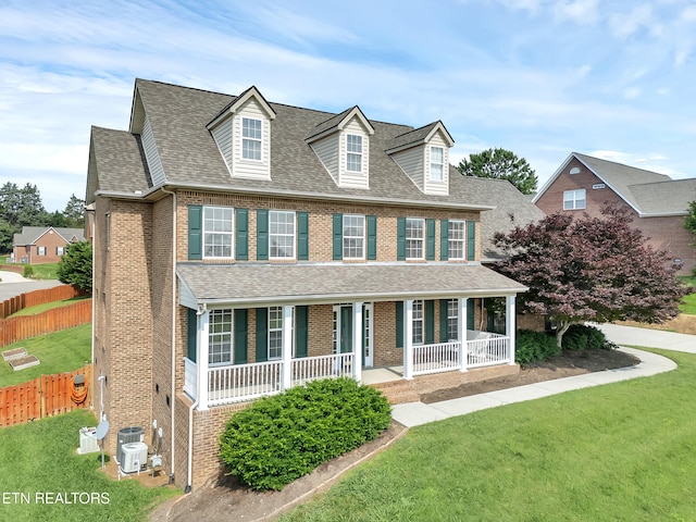 1511 Atlee Summit Ln, Knoxville, TN 37931 - view of front of home featuring brick siding, covered porch, and a shingled roof