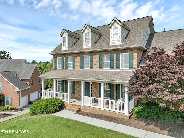 1511 Atlee Summit Ln, Knoxville, TN 37931 - view of front of property with brick siding, a porch, a shingled roof, and a garage