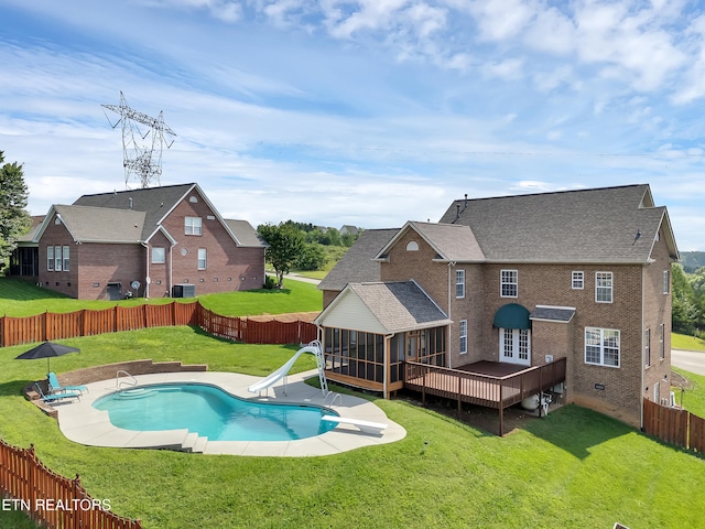 1511 Atlee Summit Ln, Knoxville, TN 37931 - view of pool featuring a sunroom, a water slide, a diving board, a fenced backyard, and a patio
