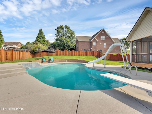 1511 Atlee Summit Ln, Knoxville, TN 37931 - view of swimming pool with a sunroom, a patio area, a water slide, a fenced backyard, and a diving board