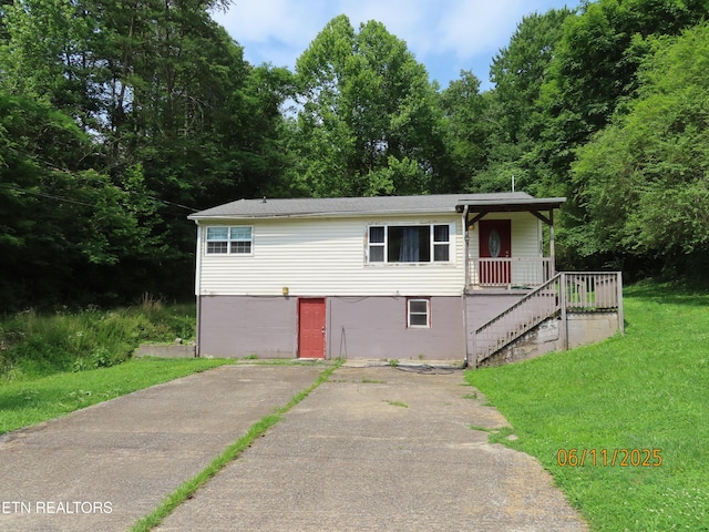 110 Dale Rd, Oakdale, TN 37829 - ranch-style home featuring stairs and a front yard