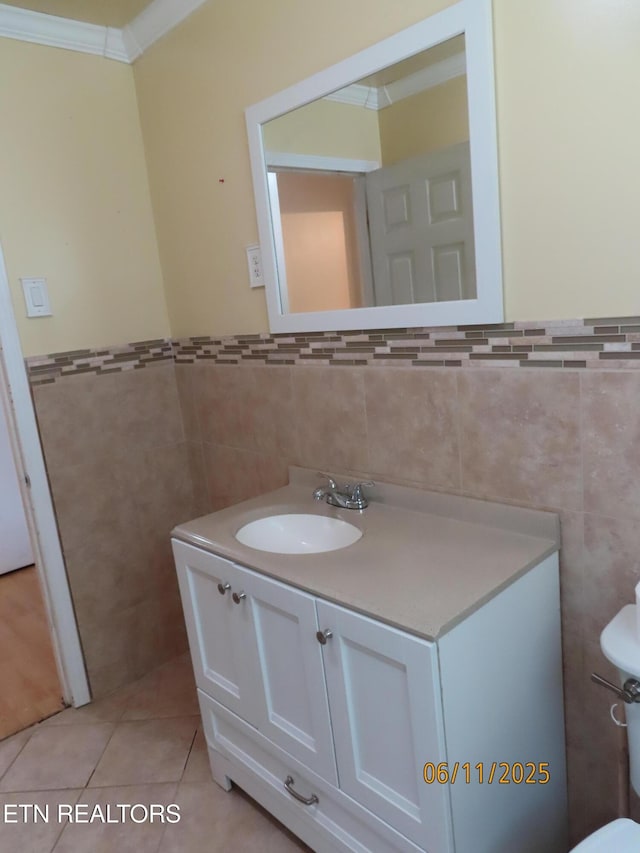 110 Dale Rd, Oakdale, TN 37829 - bathroom with tile walls, vanity, tile patterned floors, ornamental molding, and a wainscoted wall
