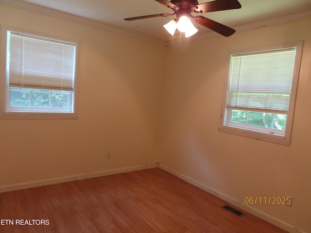 110 Dale Rd, Oakdale, TN 37829 - spare room with crown molding, light wood finished floors, healthy amount of natural light, and a ceiling fan