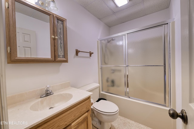 609 Lane Hollow Rd, Sevierville, TN 37876 - bathroom featuring vanity, enclosed tub / shower combo, and a drop ceiling