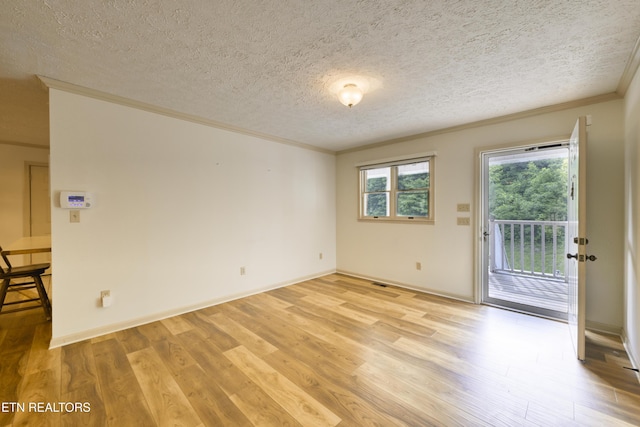 609 Lane Hollow Rd, Sevierville, TN 37876 - empty room with crown molding, light wood-style floors, and a textured ceiling
