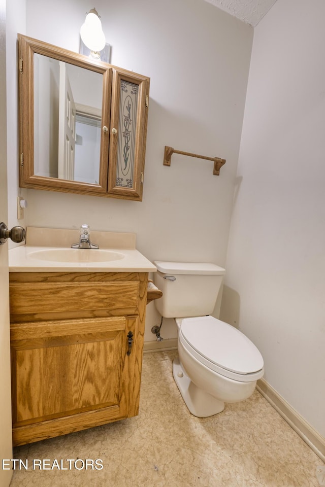 609 Lane Hollow Rd, Sevierville, TN 37876 - bathroom featuring baseboards and vanity