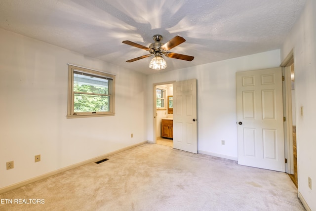 609 Lane Hollow Rd, Sevierville, TN 37876 - unfurnished bedroom featuring light colored carpet and ensuite bathroom