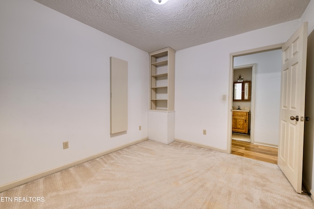 609 Lane Hollow Rd, Sevierville, TN 37876 - empty room with light colored carpet and a textured ceiling
