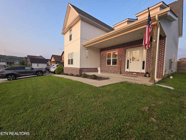 6312 Knightsboro Rd, Knoxville, TN 37912 - back of house with a lawn and brick siding