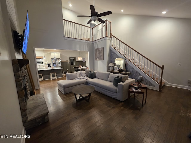 6312 Knightsboro Rd, Knoxville, TN 37912 - living area with stairway, dark wood-style flooring, ceiling fan, a high ceiling, and recessed lighting