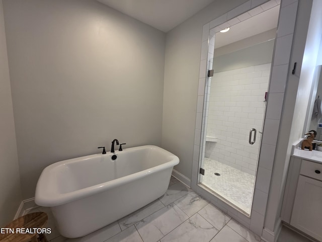 6312 Knightsboro Rd, Knoxville, TN 37912 - full bath featuring marble look tile flooring, a freestanding bath, a shower stall, and vanity