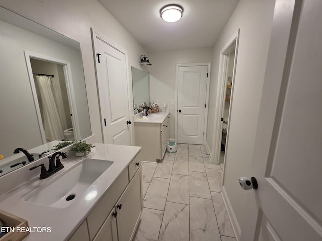 6312 Knightsboro Rd, Knoxville, TN 37912 - full bathroom with marble finish flooring and two vanities